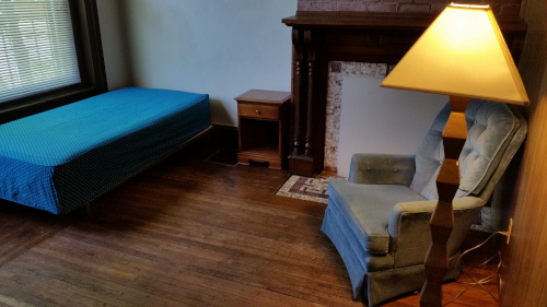 Front Bedroom with hardwood floors and large windows