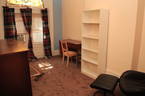 first bedroom with stained-glass window